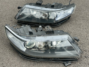 06-08 J7 euro r headlights damaged